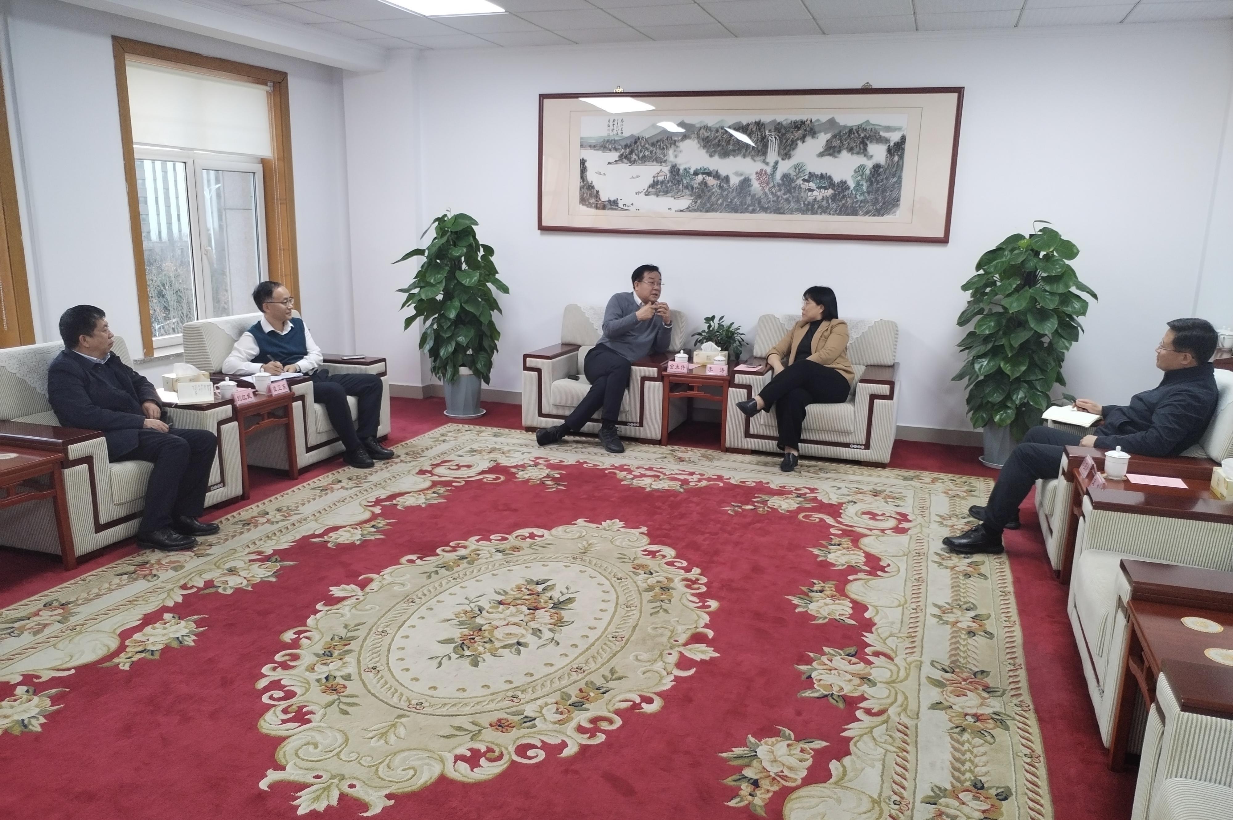 金永傳與濰坊市寒亭區委副書記、區長李...